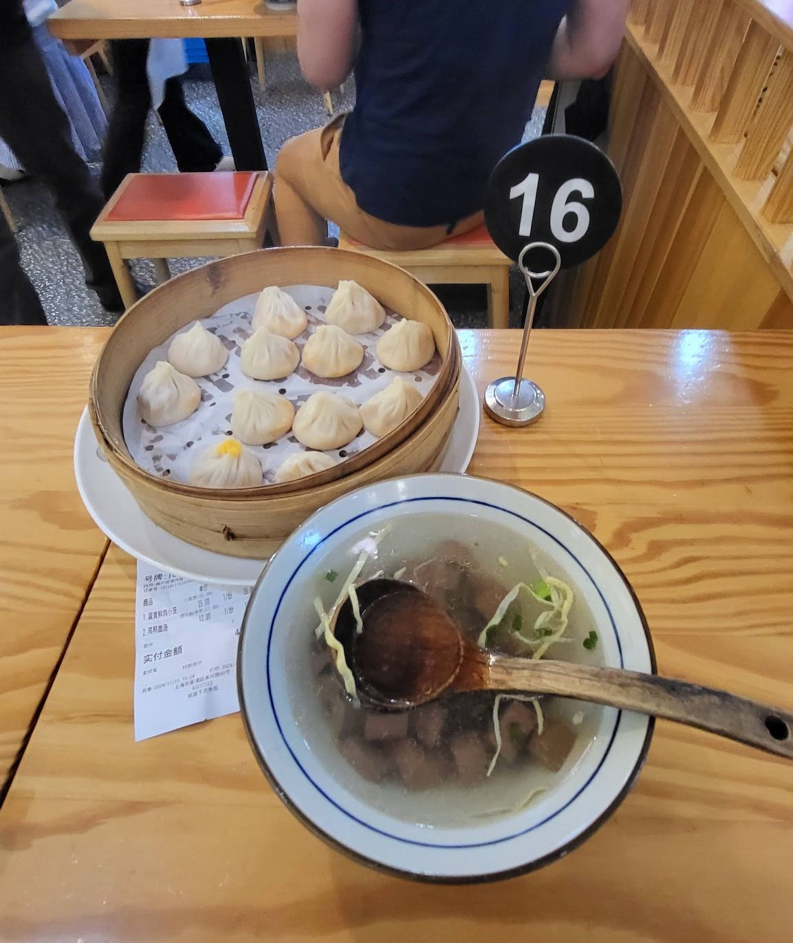 Bowl of steaming soup dumplings